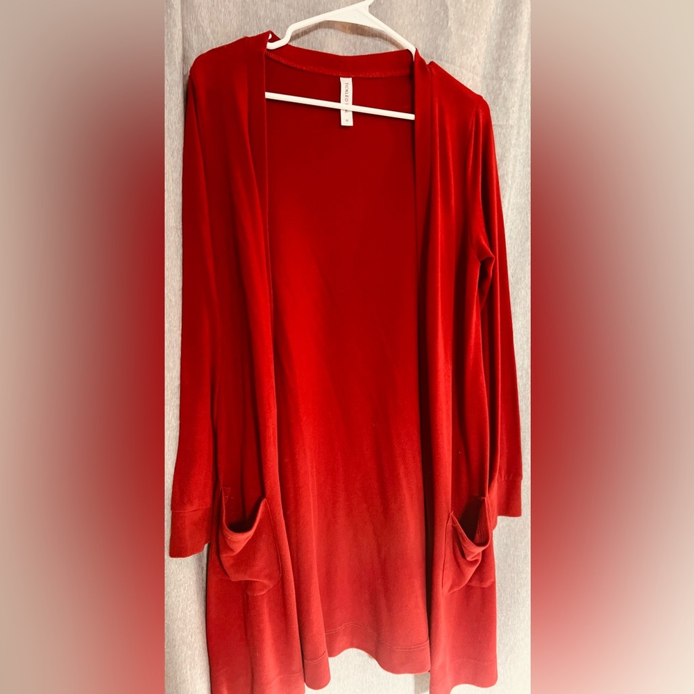 Women’s thigh length cardigan